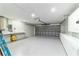 Spacious garage with ample storage, counter space, and well-lit area at 19028 Sw 101 Pl, Dunnellon, FL 34432