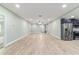 Open floor plan with tile flooring, recessed lighting, and modern finishes at 19028 Sw 101 Pl, Dunnellon, FL 34432