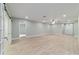 Expansive living area with stylish flooring, recessed lights, and inviting ambiance at 19028 Sw 101 Pl, Dunnellon, FL 34432
