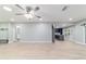 Spacious living area with modern finishes, a ceiling fan, and an open layout at 19028 Sw 101 Pl, Dunnellon, FL 34432