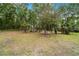 The yard is a natural retreat, perfect for enjoying the beauty of nature at 19028 Sw 101 Pl, Dunnellon, FL 34432