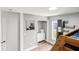 Spacious bedroom with hardwood floors and a large window providing natural light at 19942 Sw 96Th Pl, Dunnellon, FL 34432