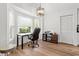 Bright office space features natural light from bay window and a dedicated desk area for remote work at 19942 Sw 96Th Pl, Dunnellon, FL 34432