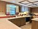 Well-lit kitchen with wood cabinets, white countertops, and modern appliances at 20100 Sw 95 St, Dunnellon, FL 34431