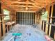 Interior view of shed featuring tools, a bicycle, and storage solutions at 20100 Sw 95 St, Dunnellon, FL 34431