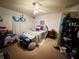 Bedroom featuring neutral walls, ceiling fan, and good natural lighting at 27 Cedar Tree Ter, Ocala, FL 34472