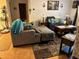 Cozy living room with comfortable seating and tile flooring at 27 Cedar Tree Ter, Ocala, FL 34472