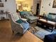 Spacious living room featuring tile floors, comfortable seating, and stylish decor at 27 Cedar Tree Ter, Ocala, FL 34472