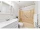 Clean bathroom featuring a vanity, toilet, and shower-tub combination at 2701 Ne 10Th St # 101, Ocala, FL 34470