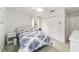 Comfortable bedroom featuring a bed, closet, and window with natural light at 2701 Ne 10Th St # 101, Ocala, FL 34470