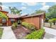 Welcoming front entrance with lovely landscaping and charming details at 2701 Ne 10Th St # 101, Ocala, FL 34470
