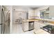 Well-maintained kitchen with stainless steel appliances, lots of counter space, and an adjacent dining area at 2701 Ne 10Th St # 101, Ocala, FL 34470