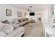 Cozy living room featuring comfortable seating, neutral colors and natural light at 2701 Ne 10Th St # 101, Ocala, FL 34470