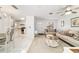 Inviting living room and dining area with neutral tones, tile flooring, and ample natural light at 2701 Ne 10Th St # 101, Ocala, FL 34470