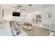 Bright open-concept living room leading into the dining area at 2701 Ne 10Th St # 101, Ocala, FL 34470