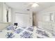 Calm primary bedroom with large closet, bright white interior, and ample natural light at 2701 Ne 10Th St # 101, Ocala, FL 34470
