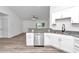 Bright open kitchen boasts stainless steel appliances and a breakfast bar overlooking the living area at 3270 Sw 151St Ct, Ocala, FL 34481