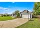Lovely home with a two-car garage, fresh landscaping, and well-maintained lawn at 380 Ne 53Rd St, Ocala, FL 34479