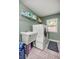 Well-equipped laundry room features a utility sink and modern washer and dryer at 380 Ne 53Rd St, Ocala, FL 34479