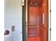 Private elevator with wood paneling, recessed lighting, and controls, offering easy access to multiple floors at 4026 Nw 85Th Ter, Ocala, FL 34482