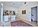 Bright living room area with wet bar, built-in shelving, and an elegant area rug at 4026 Nw 85Th Ter, Ocala, FL 34482