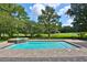 Beautiful backyard pool with spa featuring brick paver patio overlooking the green at 4026 Nw 85Th Ter, Ocala, FL 34482