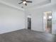 Large primary bedroom boasts en suite bathroom and walk-in closet at 4370 County Road 121D, Wildwood, FL 34785