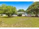 Expansive backyard featuring a lush lawn at 4880 Ne 23 Ave, Ocala, FL 34479