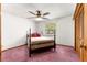 Bedroom with ceiling fan and closet at 4880 Ne 23 Ave, Ocala, FL 34479