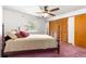 Bedroom featuring carpet flooring and natural light at 4880 Ne 23 Ave, Ocala, FL 34479