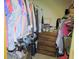 Organized walk-in closet offering plentiful storage for clothes and personal items at 5083 Se 26Th St, Ocala, FL 34480