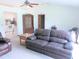 Inviting living room with comfortable seating and an open view to the kitchen area at 5083 Se 26Th St, Ocala, FL 34480