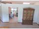 Bright living room featuring a china cabinet and a view into the dining area at 5083 Se 26Th St, Ocala, FL 34480