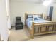 Relaxing main bedroom with a ceiling fan and view to the ensuite bathroom at 5083 Se 26Th St, Ocala, FL 34480