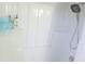 Bright shower-tub combination with a rainfall shower head and neutral tones at 5083 Se 26Th St, Ocala, FL 34480