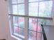 A window shows a lovely bench and manicured landscape at 5083 Se 26Th St, Ocala, FL 34480