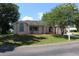 Charming single-story home with a well-manicured lawn and a welcoming front porch at 5110 Nw 19Th Pl, Ocala, FL 34482
