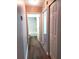 Hallway features a bathroom and storage space at 5110 Nw 19Th Pl, Ocala, FL 34482