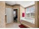Bright bathroom featuring a tub, and tile floors at 5174 Se 41St Ave, Ocala, FL 34480