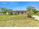 Charming single-story home with a well-manicured front yard at 5720 Se 20Th St, Ocala, FL 34480
