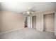 A spacious bedroom offers closet space and an ensuite bathroom at 5720 Se 20Th St, Ocala, FL 34480