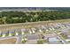 Bird's eye view of houses and community streets that are surrounded by lush green landscaping and trees at 5842 Sw 78Th Avenue Rd, Ocala, FL 34474
