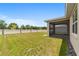 Well-maintained backyard with a screened patio, beautiful fencing, and room to enjoy the outdoors at 5842 Sw 78Th Avenue Rd, Ocala, FL 34474