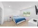 Cozy bedroom with a window view, a comfortable bed, and bright, neutral decor at 5842 Sw 78Th Avenue Rd, Ocala, FL 34474