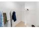 Walk-in closet with hanging racks and shelving for ample storage at 5842 Sw 78Th Avenue Rd, Ocala, FL 34474