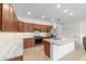 Spacious kitchen with stainless steel appliances, granite countertops, and ample cabinet space at 5842 Sw 78Th Avenue Rd, Ocala, FL 34474