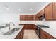 Well-equipped kitchen with granite countertops, stainless steel appliances, and ample storage at 5842 Sw 78Th Avenue Rd, Ocala, FL 34474