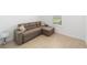 Inviting living room featuring a comfortable sectional couch and bright natural light at 5842 Sw 78Th Avenue Rd, Ocala, FL 34474