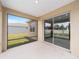 Enjoy the outdoors from this screened-in patio with views of the grassy backyard at 5842 Sw 78Th Avenue Rd, Ocala, FL 34474
