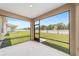 Enclosed patio with backyard view is perfect for entertaining or relaxing at 5842 Sw 78Th Avenue Rd, Ocala, FL 34474